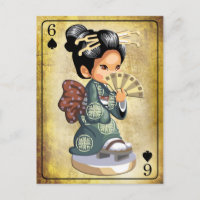 Japanisches Mädchen in Kimono mit einem Ventilator