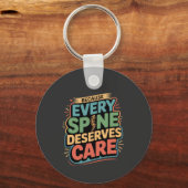 Jede Wirbelsäule verdient ein Sorgfalt-Chiroprakto Schlüsselanhänger (Vorderseite)