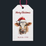 Jersey Cow "Moory Christmas" Geschenkanhänger<br><div class="desc">Mit diesem "Moory Christmas"-Geschenketikett mit einer zauberhaften Jersey-Kuh in einer Weihnachtsmannmütze verbringen Sie einen frischen Feiertagssjubeln. Dieses Geschenketikett ist perfekt für jeden, der während der Ferien Lieben spielt, Tiere auf dem Bauernhof und ein bisschen Spaß hat. Die Vorderseite zeigt eine festliche Kuh mit dem spielerischen Gruß "Moory Christmas". Voll personalisieren...</div>