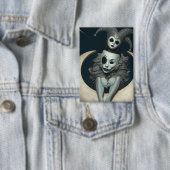 Jester sits on crescent moon wireless charger button (Insitu)