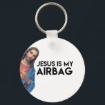 Jesuis my Airbag Schlüsselanhänger<br><div class="desc">Add a touch of humor to your car with this 'Jesus is my airbag' design. Printed on high-quality materials,  this artwork is sure to make you smile while keeping you safe on the road. Perfekt for anyone who loves to add some fun to their ride!</div>