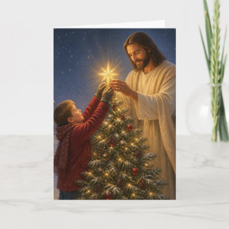 Jesus hilft einem kleinen Jungen den Weihnachtsbau Feiertagskarte