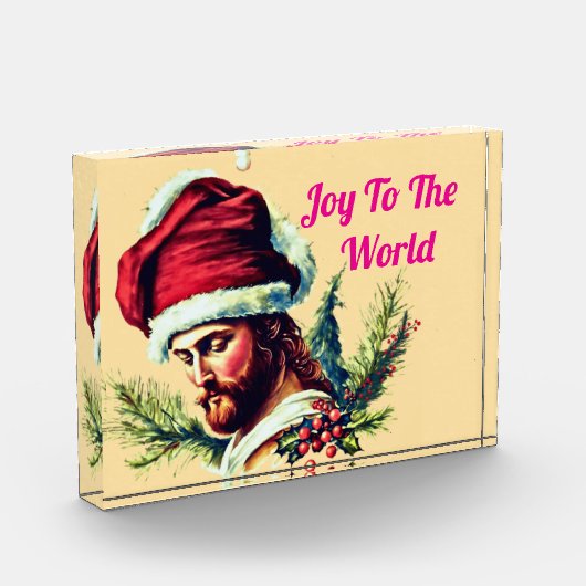 Jesus mit bestickter Weihnachtsmannmütze Fotoblock (Links)
