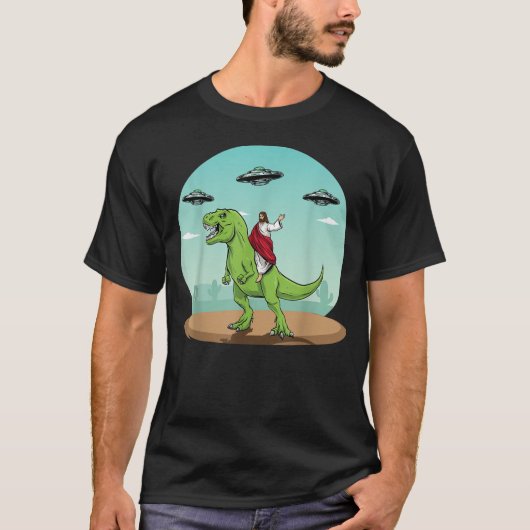 Jesus Riding A Dinosaur Funny Bigfoot UFO Alien T-Shirt (Vorderseite)