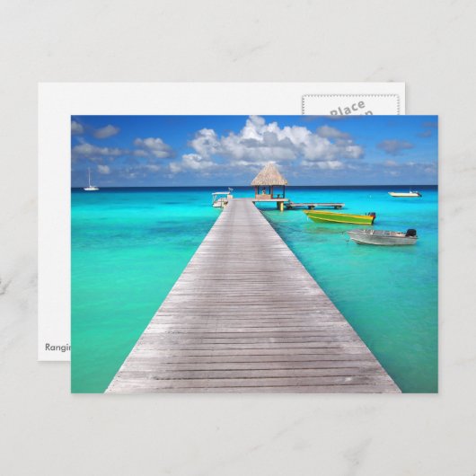 Jetty mit Booten in einer tropischen Lagune Postkarte (Vorne/Hinten)