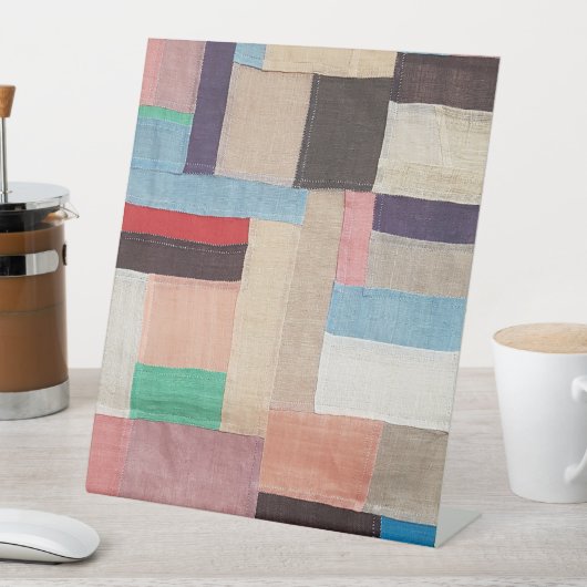 Jogakbo, Handnähte Sockelschild (In Situ)