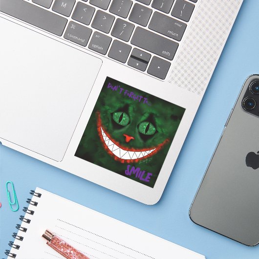 Joker Cheshire Sticker (Laptop mit iPhone)