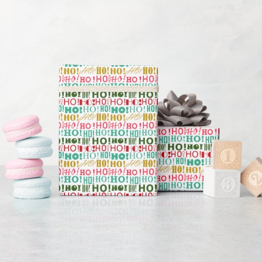 Jolly HO! HO! HO! Farbiges Weihnachtswrapping Geschenkpapier (Babyparty)