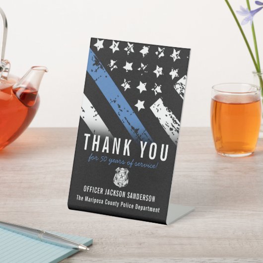 Jubiläumsflagge der Polizei Sockelschild (In SItu)