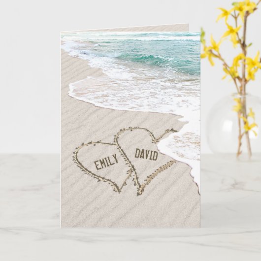 Jubiläumsstrand hört in Sand mit Namen Karte (Gelbe Blume)