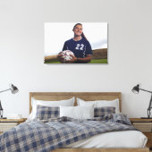 Jugendfußballspieler mit Fußballball Leinwanddruck (Insitu (Schlafzimmer))