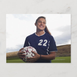 Jugendfußballspieler mit Fußballball Postkarte