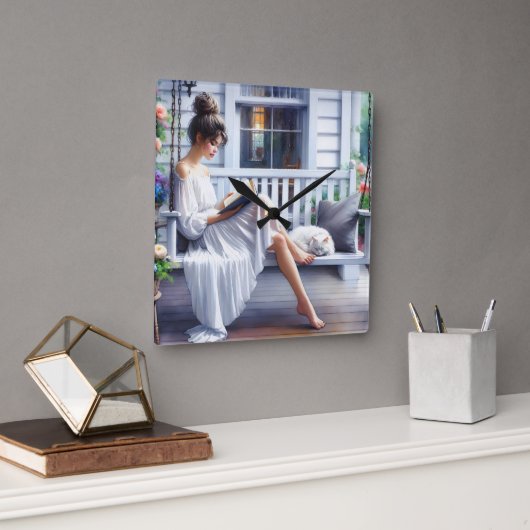 Junge Frauen lesen ein Buch mit Katze Quadratische Wanduhr (Büro)