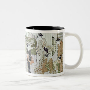 Junge Frauen mit einem Korb der Chrysanthemen Zweifarbige Tasse