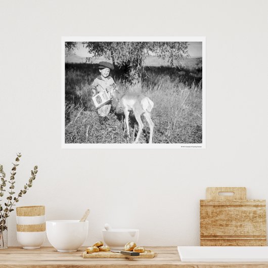 Junge füttre Antilope von Hand Poster (Küche)