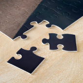 Junge im Ruderboot, geleitet von einem Kompass Puzzle (Seite)
