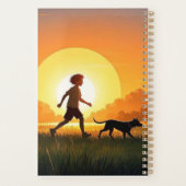 Junge Junge mit Hund bei Sonnenuntergang Planer (Rückseite)