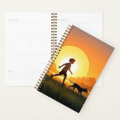 Junge Junge mit Hund bei Sonnenuntergang Planer (Anzeige)