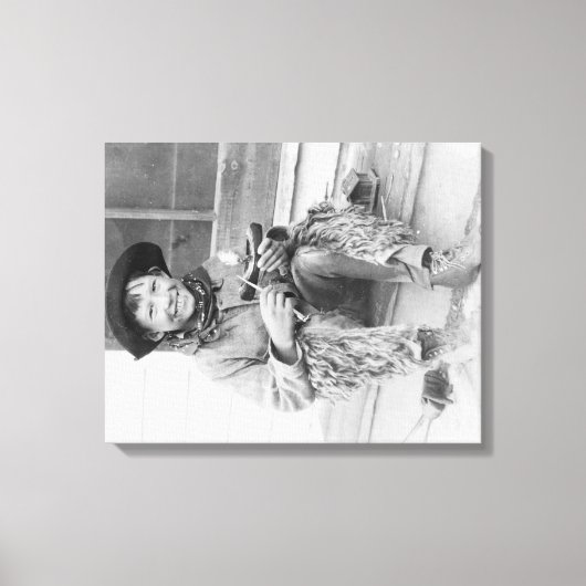 Junge Junge verkleidet als Cowboy mit Spielzeug Leinwanddruck (Vorderseite)