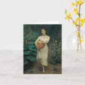 Junge Mädchen, die einen Pumpkin tragen Karte (Gelbe Blume)