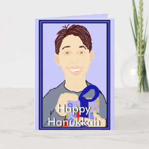 Junge mit Geschenkkarte Happy Hanukkah Feiertagskarte