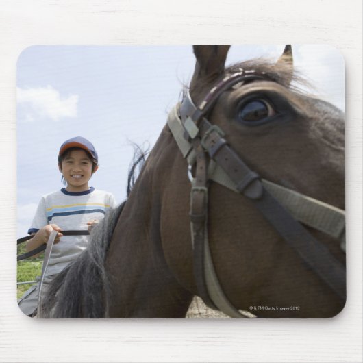 Junge reiten ein Pferd Mousepad (Vorne)