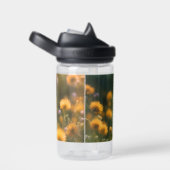 Junge Spitz Welpe im Blume-Feld Trinkflasche (rechts)