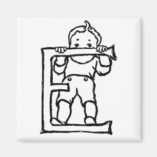 Junge stehend auf Magneten des Buchstabe-"E" - Magnet