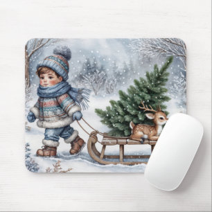 Junge zieht einen altmodischen Schlitten mit Baum Mousepad