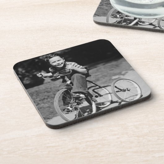 Jungen-Reitdreirad Untersetzer (Linke Seite)