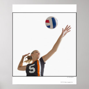 Junges Mädchen (16-17) Volleyball spielend Poster