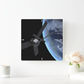 Juno Raumfahrzeug während der Erde Flyby Quadratische Wanduhr (Zuhause)