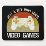 Just A Boy Who Loves Video Games Mousepad<br><div class="desc">Just A Boy Who Loves Video Games. This funny gamer accessory is a great gift for a man, boy, teens & kids who love playing video games & computer games. If you're a geek and love console games & computer gaming, this design is for you! Includes a graphic of a...</div>
