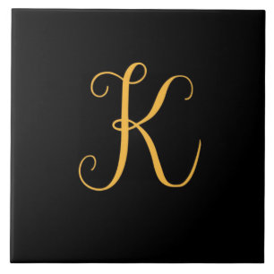 K Gold auf schwarzer Monogramm Fliese