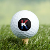 K Monogram überlagert sich auf NLD Flag auf bk be6 Golfball (Insitu T-Shirt)