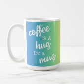 Kaffee ist ein Umarmer in einer Tasse-Regenbogen-T Kaffeetasse (Links)