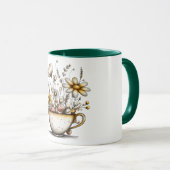 Kaffeetasse mit Blumendesign, die in der Tasse wac (VorderseiteRechts)