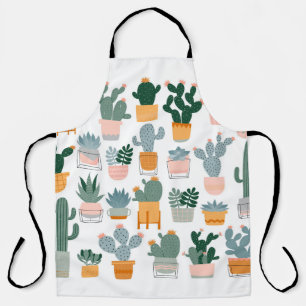 Kakteen und Sukkulente in Töpfen auf weißem Hinter Schürze