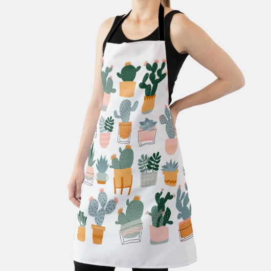 Kakteen und Sukkulente in Töpfen auf weißem Hinter Schürze (InSitu)