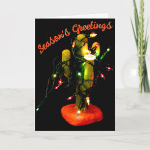 Kaktuskerze umwickelt mit Weihnachtslichtern Karte