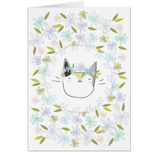 Kaliko-Katze mit Wildblumen