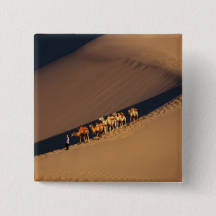 Kamelkarawane in der Wüste, Dunhuang, Gansu Button