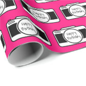 Kamera mit Geburtstagstext auf rosa Geschenkpapier (Rolleneckpunkt)