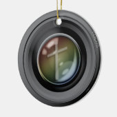 Kameraobjektiv-Verzierung. Fokus auf Jesus Keramik Ornament (Links)