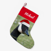 Kanadas Gans mit roter Weihnachtsmannmütze und Nam Kleiner Weihnachtsstrumpf (Vorderansicht (hängend))