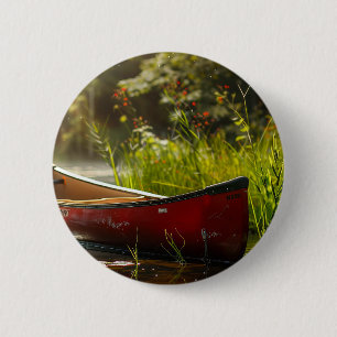 Kanadier in einem Fluss Button