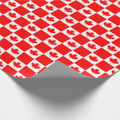 Kanadisches Party unter der Flagge von Rotapfel am Geschenkpapier (Ecke)