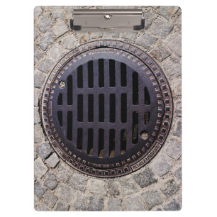 Kanaldeckel- und Kopfsteinstraße Klemmbrett