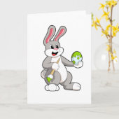 Kaninchen beim Anmalen mit Ei Karte (Gelbe Blume)