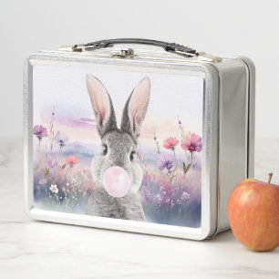 Kaninchen bläst Bubble Gum auf einem Feld mit Wild Metall Brotdose
